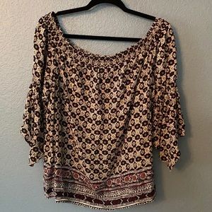 Star print black with burgundy blouse.